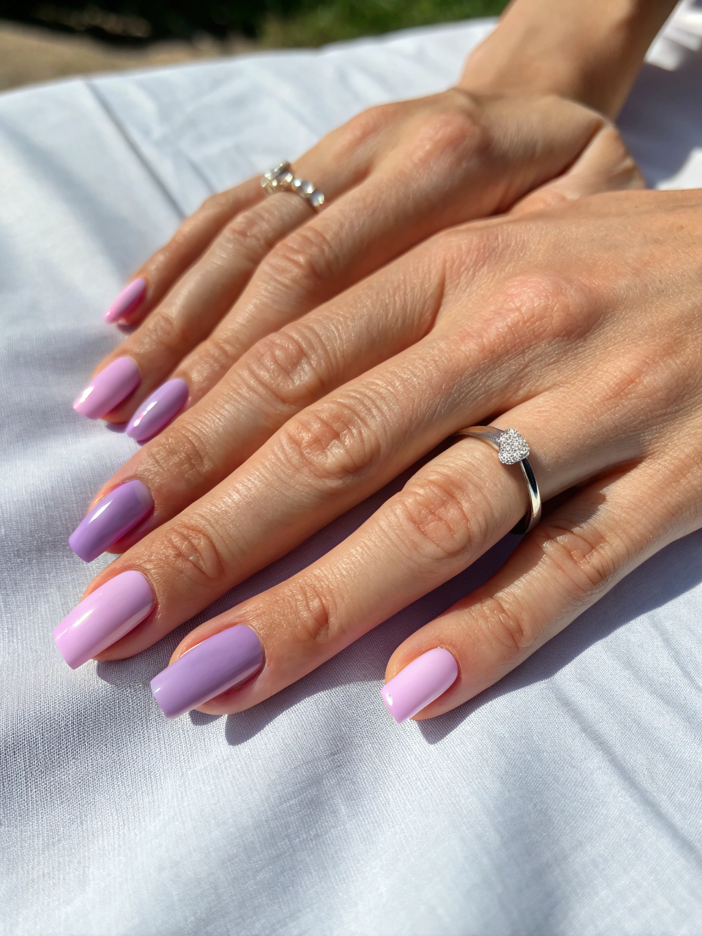 Dip powder manicure application on natural nails